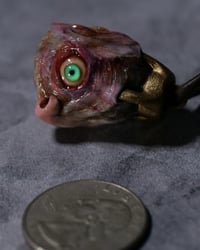 Image 9 of Egg of the King bruised pendant, leather cord, brass hardware