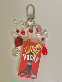 Image 1 of pocky trinket