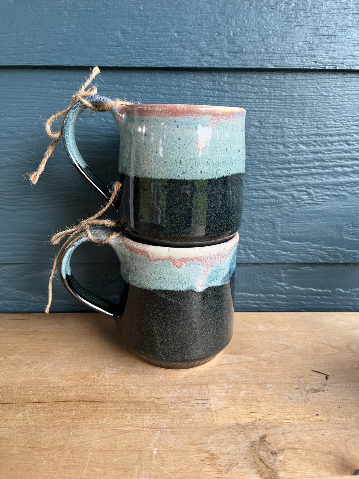 Image of M38 Matching Black Speckled Glaze With Pinkish Blue Lip White Inside