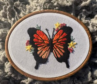 Image 1 of oval butterfly hoop