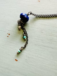 Image 11 of faceted lapis pendant with Kingman turquoise and pearl fringe