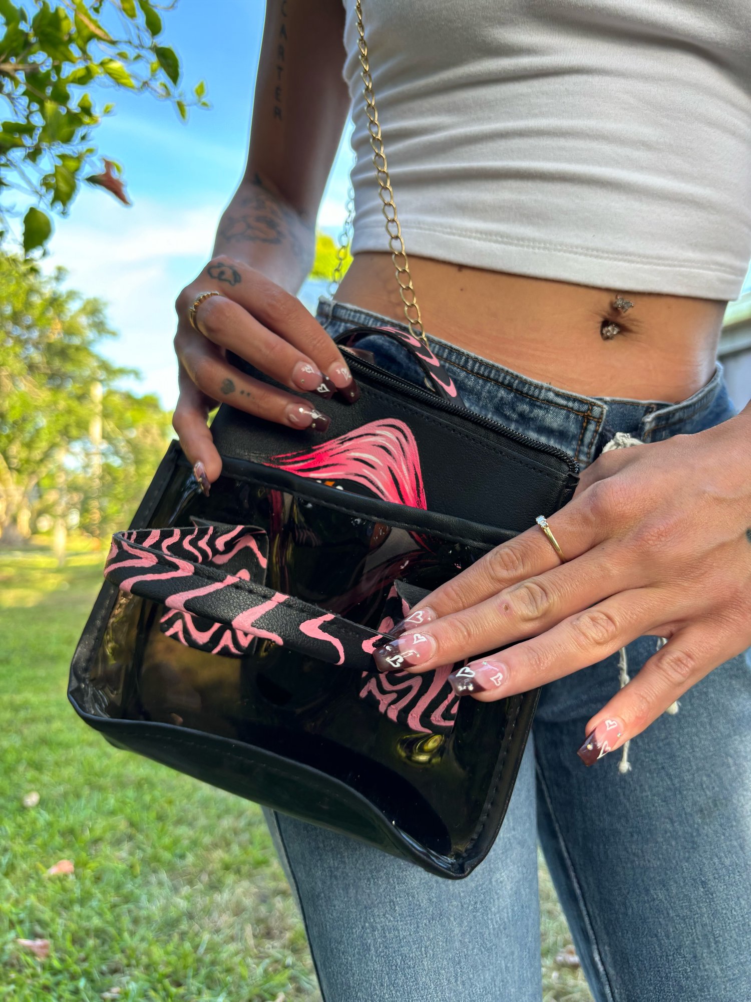Image of Black and pink swirl purse 