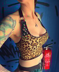 Image 1 of studded leopard top size SMALL