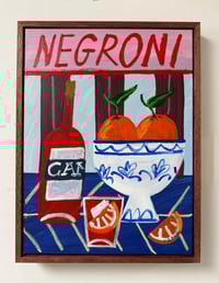 Negroni with oranges in vase framed