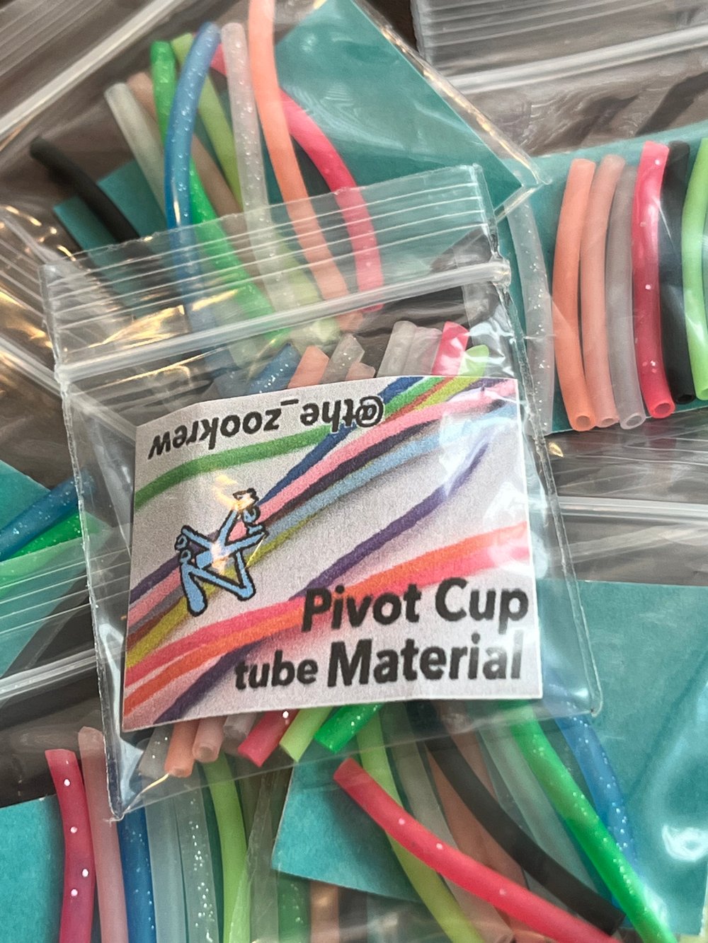Pivot cup tube material