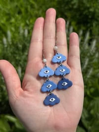 Image 2 of clouds with eyes