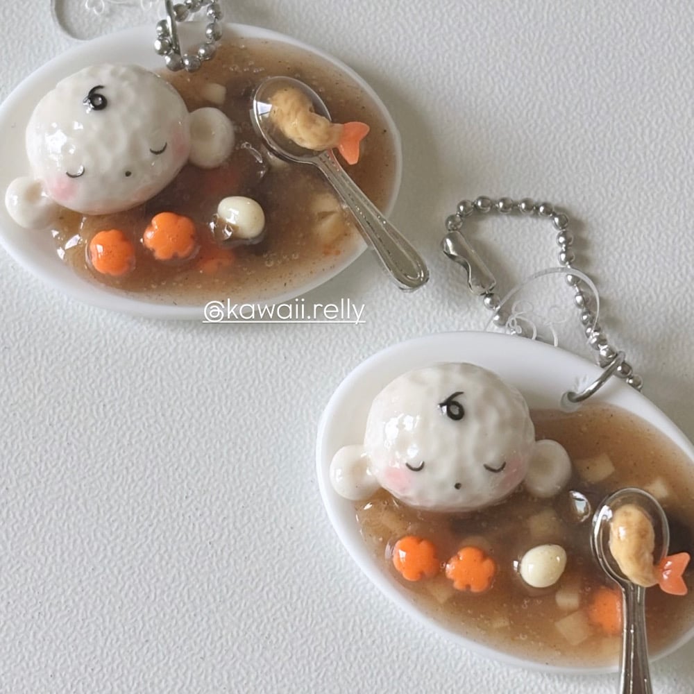 Image of Momo Taking a Curry Nap - ball keychain