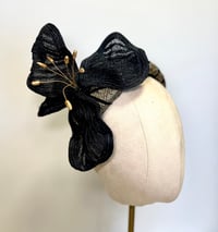 Image 1 of Black and gold headpiece