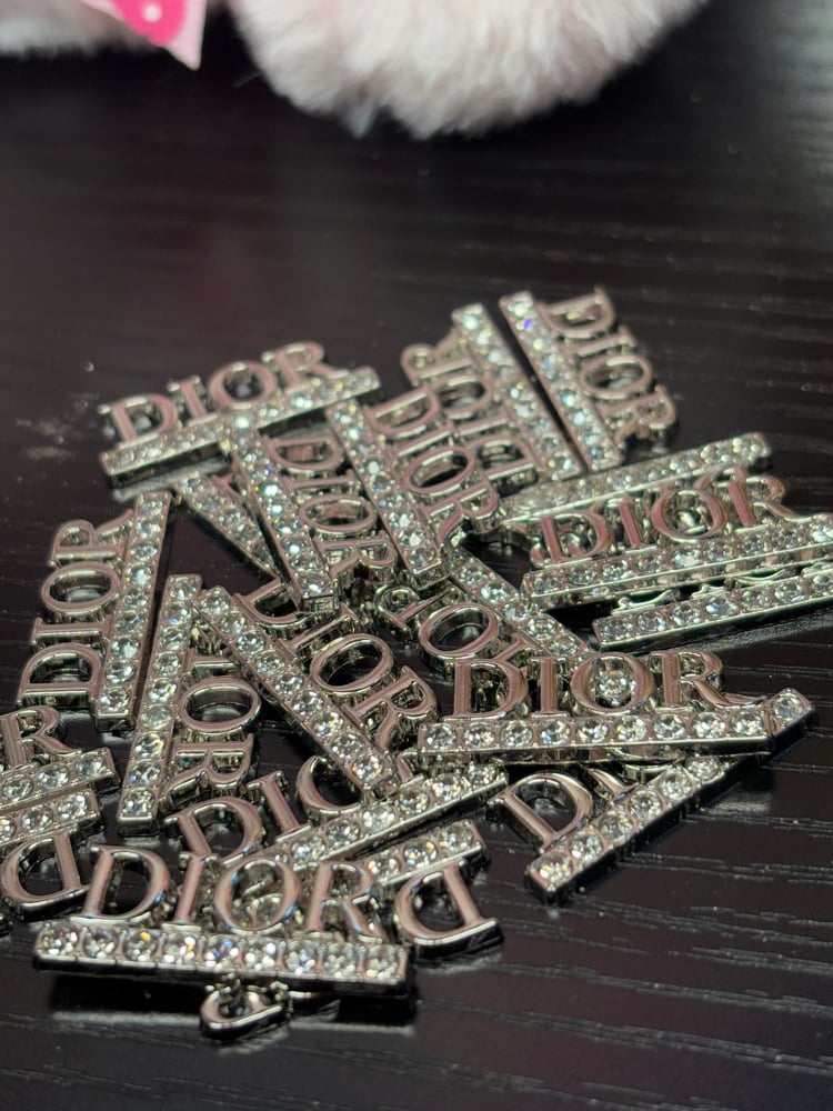 Image of diorè sign charms