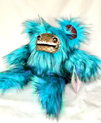 Image 1 of Black and Blue Furball 
