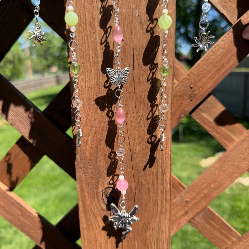 Image of sun fairy hanging beaded wood art 