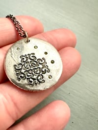 Image 7 of green sapphire pendant with handwritten quote