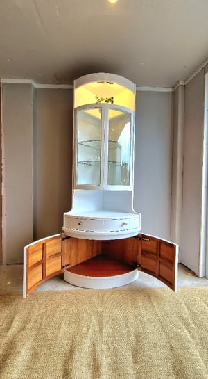 Image of Nathan Corner Drinks Cabinet unit in White with light.
