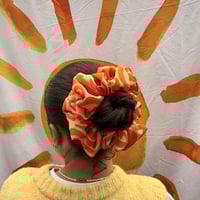 Image 1 of orange swirl