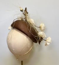 Image 4 of Brown parisisal face hugger