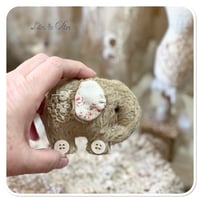 Image 4 of Handmade beige flat elephant with "button wheels"