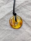 Baltic light Amber donut pendant with cord 