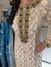 Image 4 of thamana