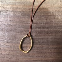 Image 2 of Texture teardrop pendant in silver or 24k gold plated on leather