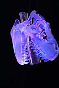 Image 3 of Glopal (uv reactive) T-Rex skull pendant with dichro tip and crushed opal teeth. 