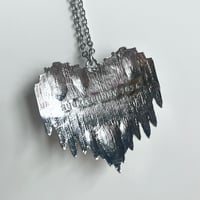 Image 3 of silver bullet heart necklace 