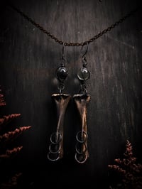 Image 5 of glass and bone