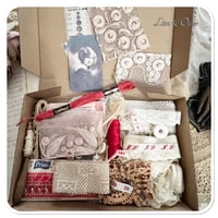 Image 3 of box of vintage french lace and other haberdashery items.