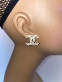 Gold toned Cd inspired diamond earrings 