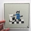 Small square print -cat making coffee