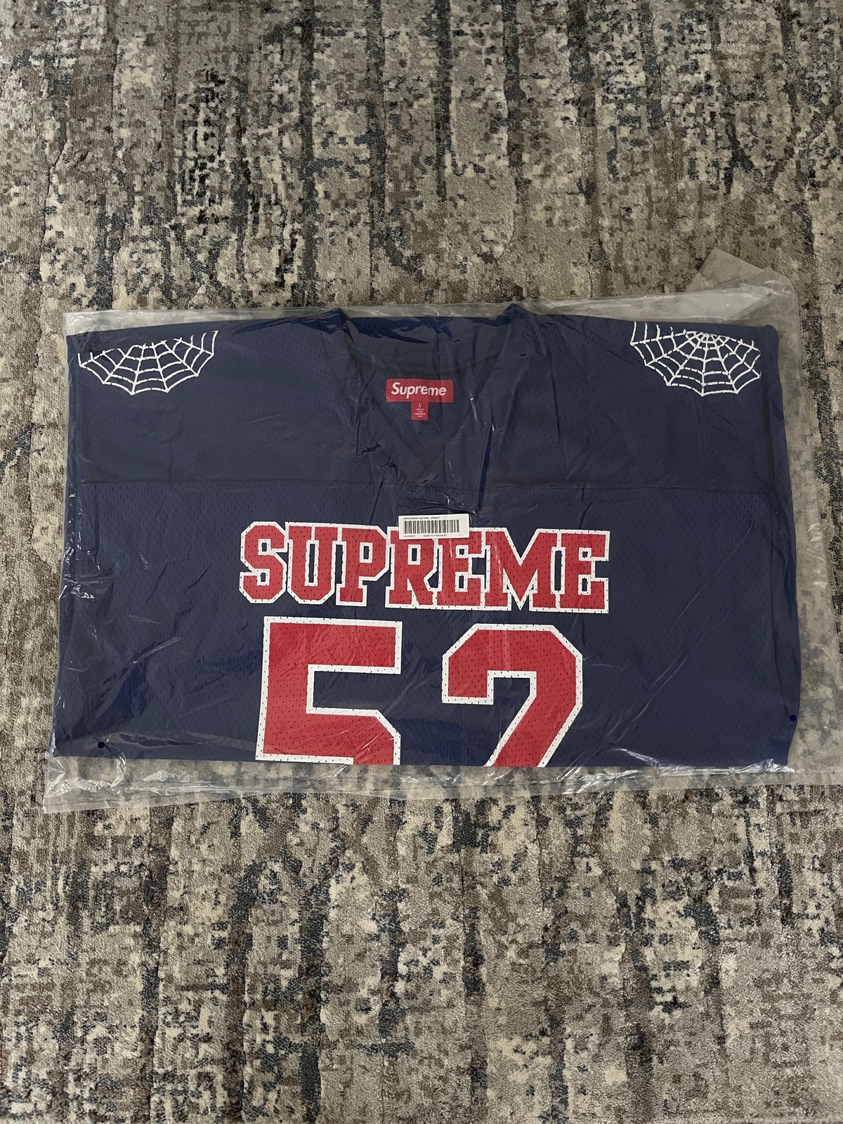 Supreme Spiderweb Football Jersey Navy | Pinc. US
