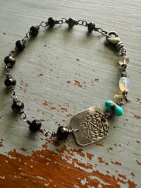 Image 10 of faceted gemstone and sterling silver medallion bracelet