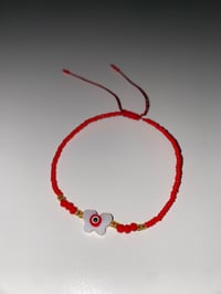 Image 1 of Red/white butterfly evil eye bracelet 