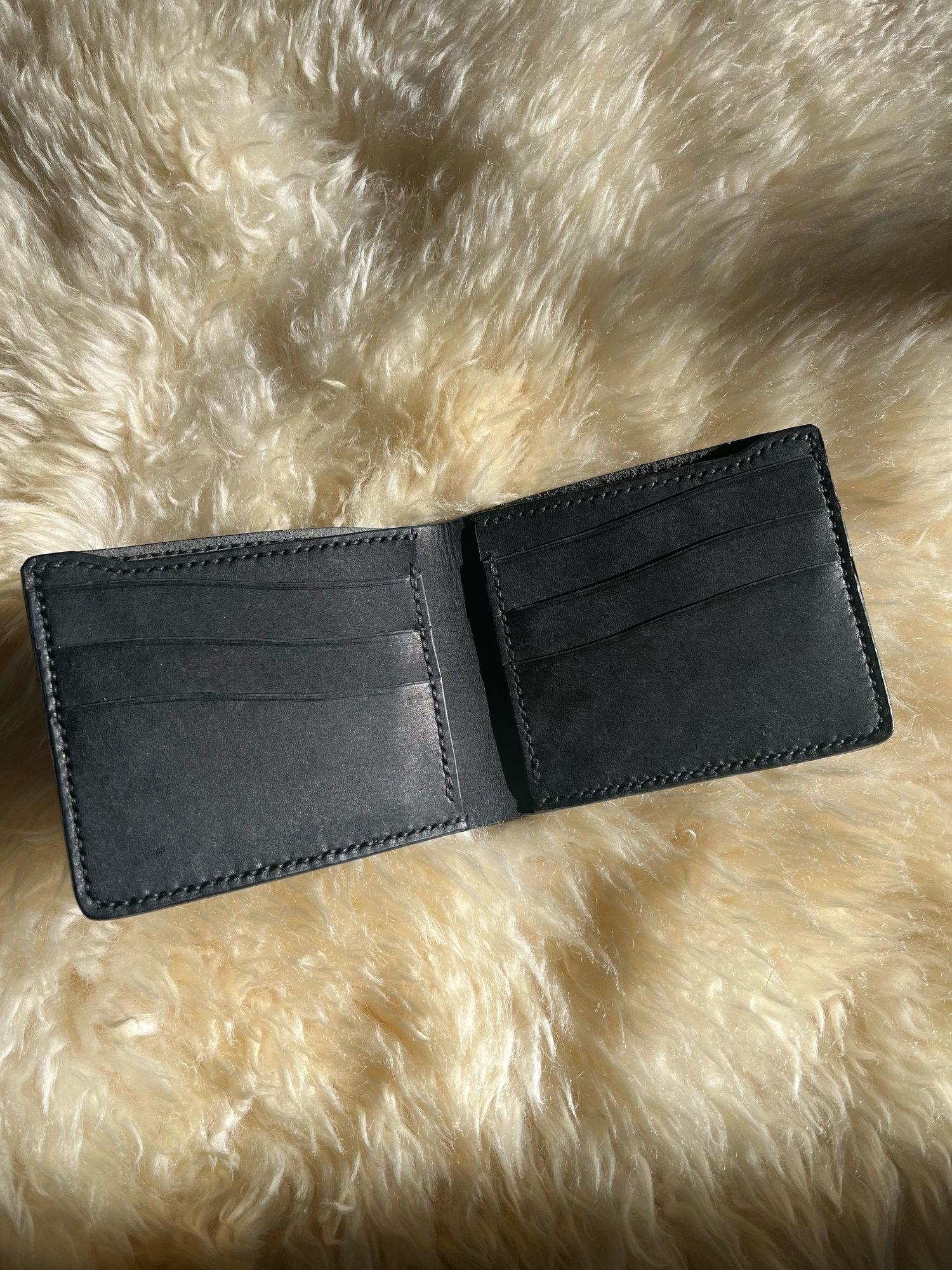 Image of Black Pueblo 9-pocket Bifold 