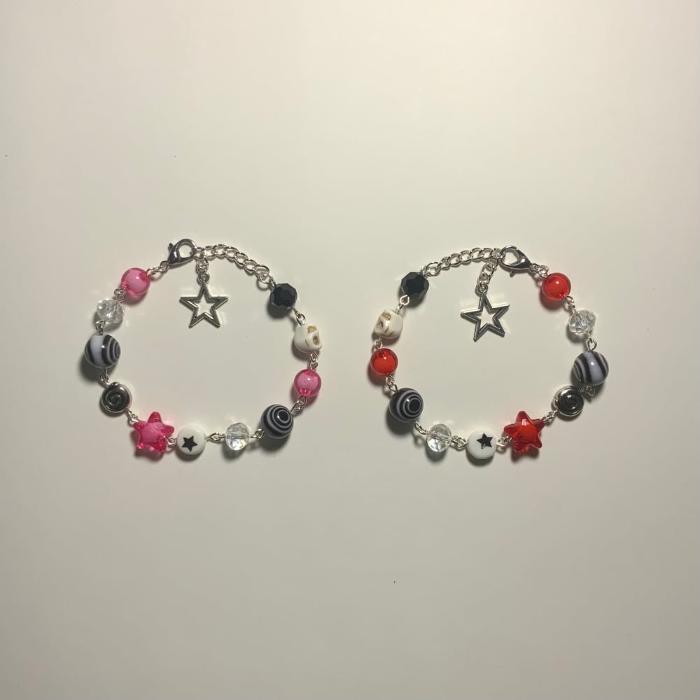 Image of matching star bracelets 𖦹°‧★