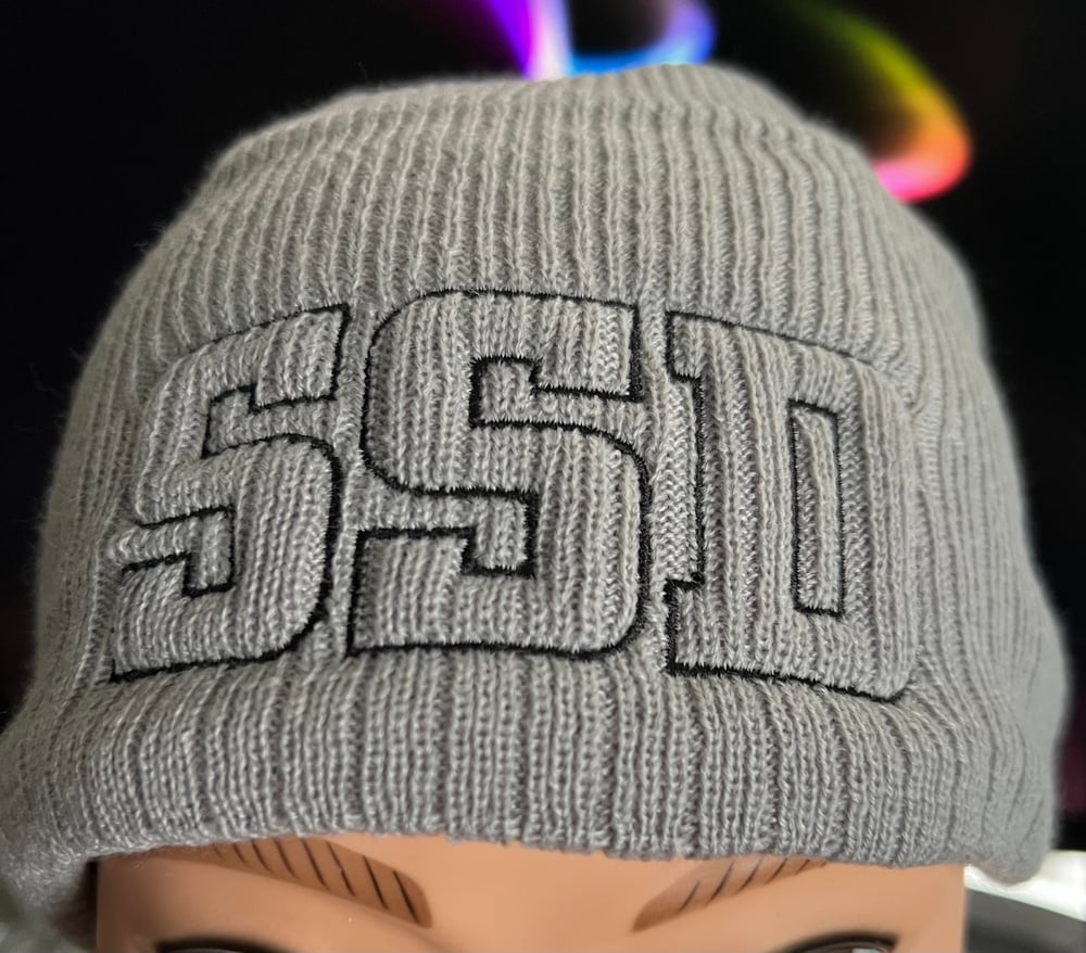 Grey New Era Knit beanie with Black Outline SSD logo 