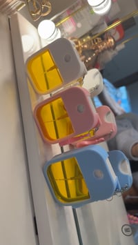 Image 1 of KEYCHAIN TANNING OIL