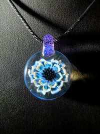 Image 1 of Uv reactive flower pendant.. 🌼 