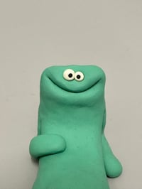 Image 2 of happy relaxed green thing