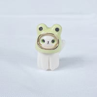 Image 1 of white cat with frog hat ceramic figurine