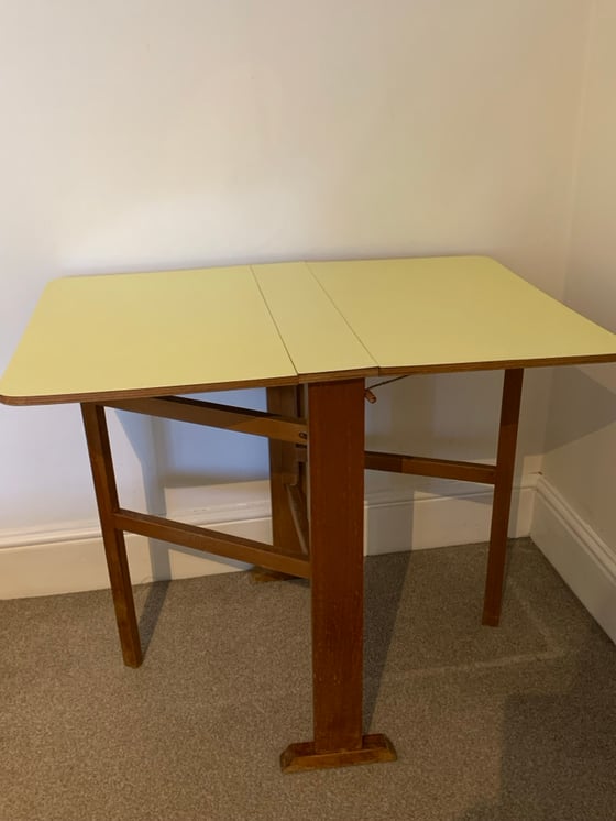 Image of Dropleaf Yellow Formica Table