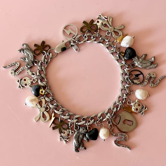 Image of One of a Kind Charm Bracelet - Lock, snakes, bears, bows, pearls