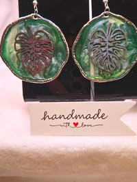 Image 4 of Handcrafted Resin Circular Monstera Leaf Earrings 