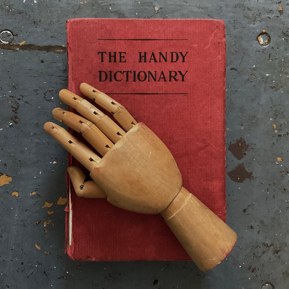 Image of Small Articulated Hand & Dictionary 