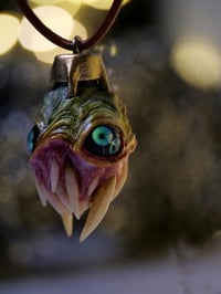 Image 13 of Egg of the King all seeing fangs pendant, leather cord, brass hardware, OOAK