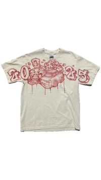 Image 1 of 2 much heat cream tee