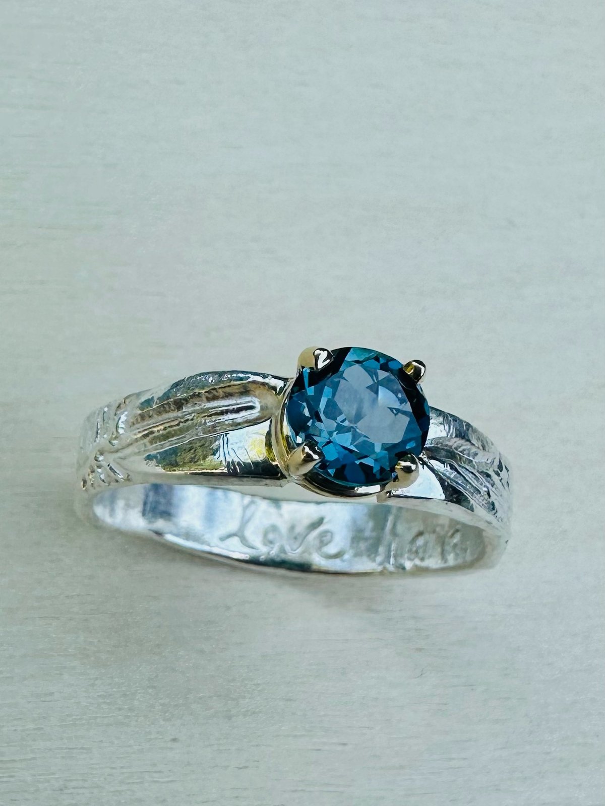 sterling silver feather ring with blue topaz | peaces of indigo sterling silver feather ring with blue topaz | peaces of indigo