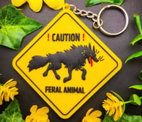 Image 2 of CAUTION FERAL ANIMAL Double-Sided 3D PVC Rubber Keychain