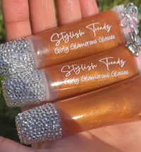 Image 1 of *BLINGALISCOUS Gloss Keychain* “CEO,000” Bronze Gold Shimmery Vanilla Scented Gloss!
