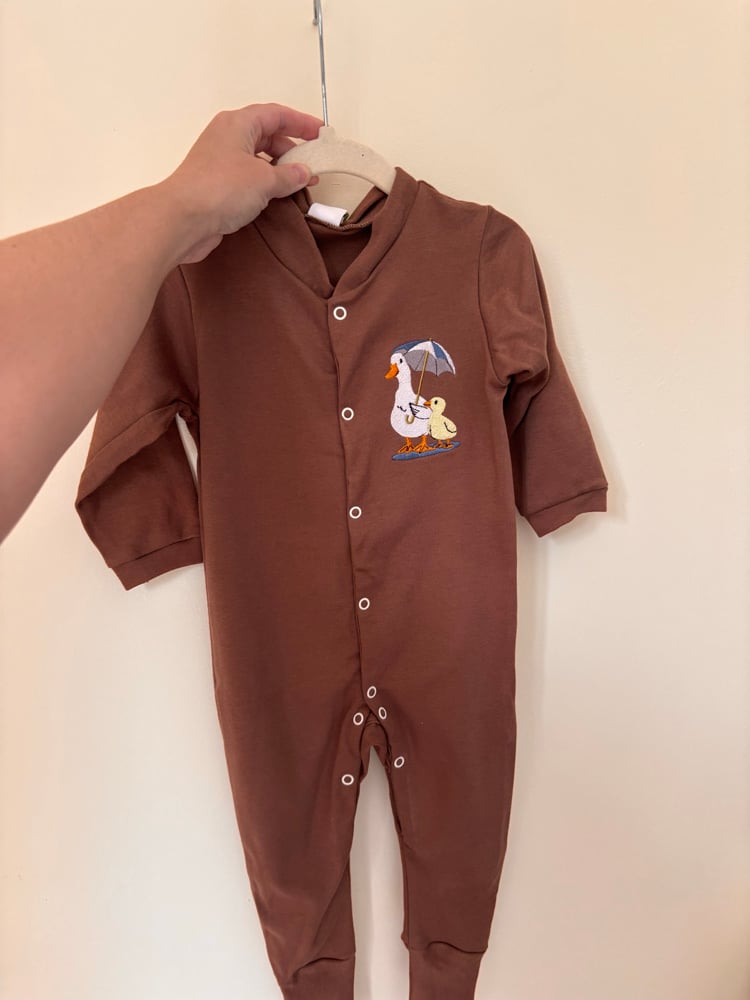 Image of Brown baby grow 12-18