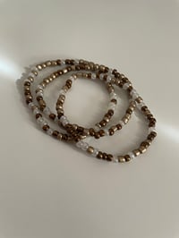 Image 3 of Bronze stacker